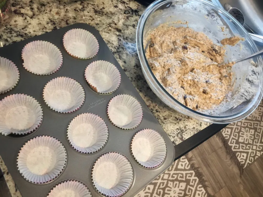 muffin liners in the pan and batter in the bowl