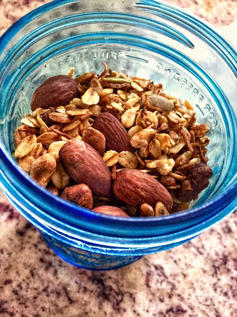 homemade granola in a blue jar