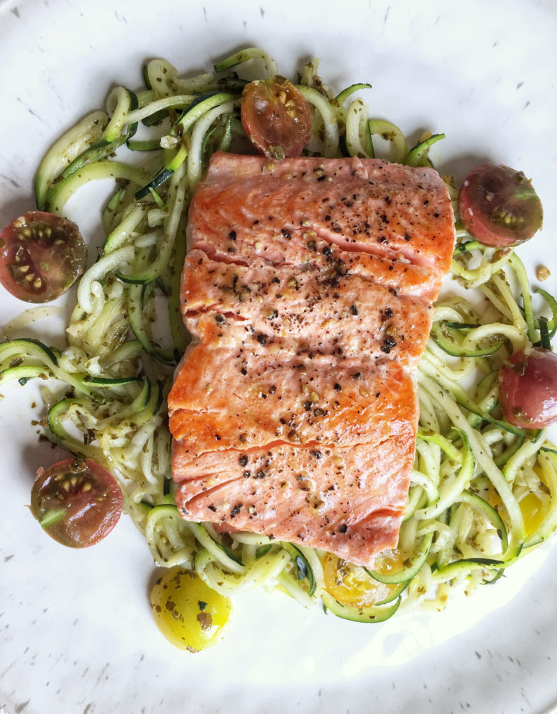 wild sockeye Alaskan salmon with farm fresh heirloom tomatoes and pesto noodles